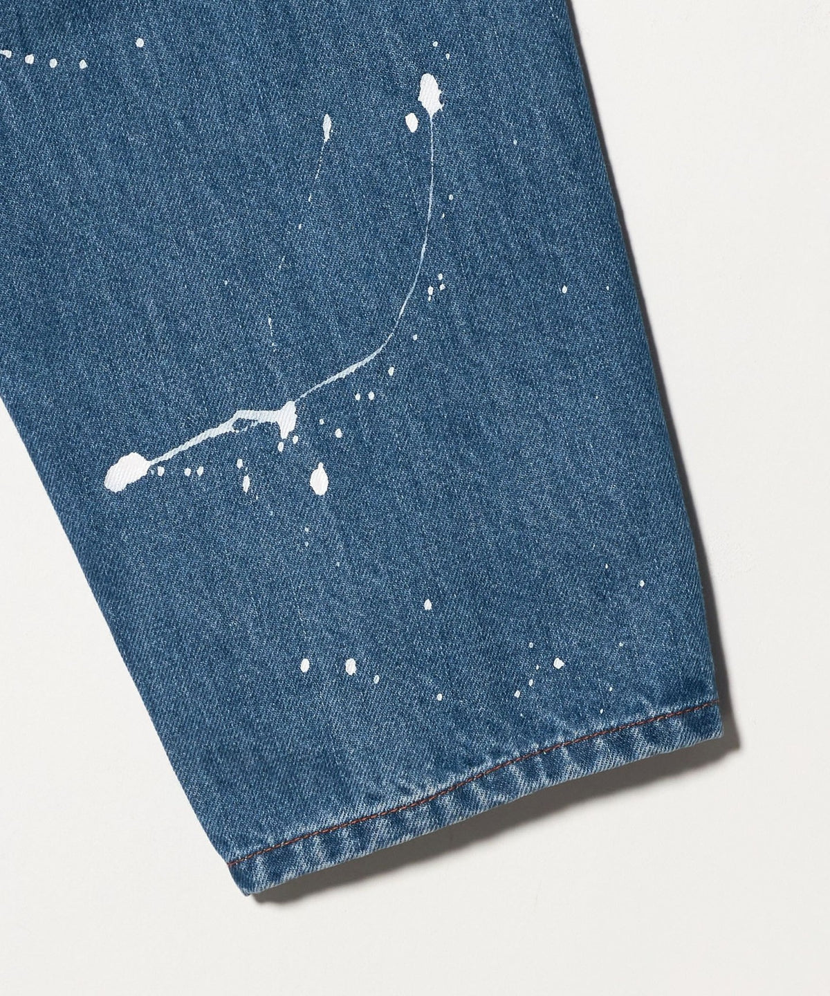 Modèle exclusif <WESCOT> : Salopette en denim à peinture éclaboussée